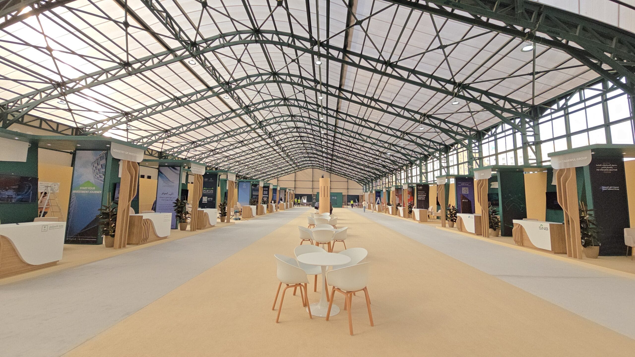 Alt Text: *A large expo center featuring DOMER CONTIROOF translucent polycarbonate panels, providing natural, evenly diffused daylight across the spacious interior.*